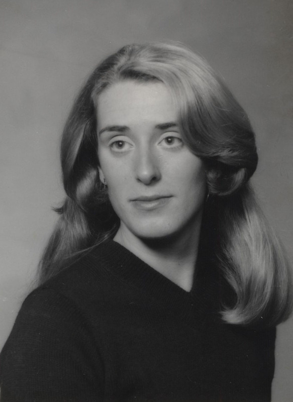 Ann Manchester Molak seated for a yearbook photo.