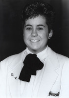 Shelley McBride poses for a photograph in a Friars Club jacket.
