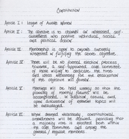 Handwritten document titled "Constitution" with six articles outlining the objectives, membership criteria, election process, meeting schedules, and amendment procedures for an organization called the League of Aware Women.