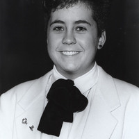 Shelley McBride poses for a photograph in a Friars Club jacket.