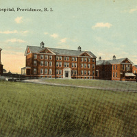 Vintage postcard of New City Hospital in Providence, Rhode Island, showing red brick buildings with white trim, a central entrance with steps, and a grassy foreground under a blue sky.