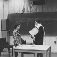 Marilyn Currier stands in a music room with Sister Gail Himrod.