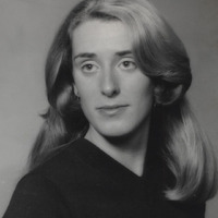 Ann Manchester Molak seated for a yearbook photo.